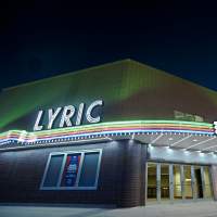 Exterior of Lyric Theater at night.